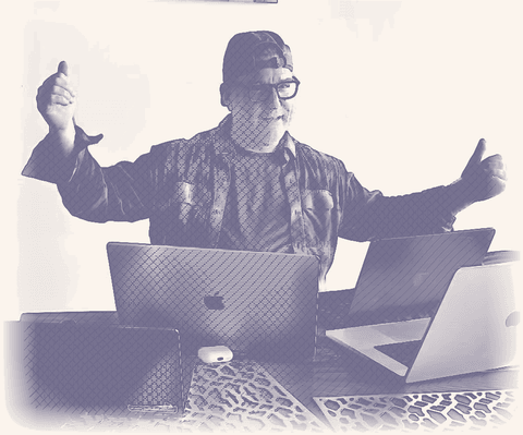 Stylized illustration of the author, arms out, behind a table with four laptops